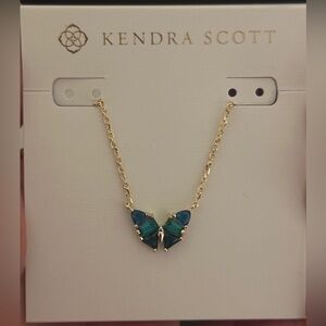 Kendra Scott Blair Gold Butterfly Small Short Pendant Necklace in green crystal